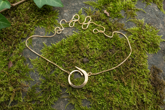 Följeslagaren lås på venetziakedja i 18k rödguld